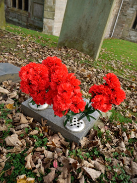 Online-Floristen-liefern-Blumenschmuck-fuer-die-Beerdigung